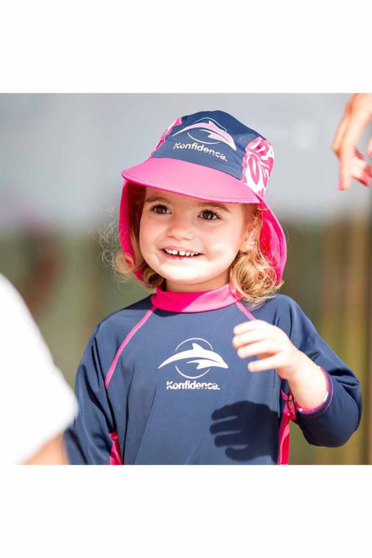 UN 50+ SUNSPORT HATS NAVY PINK 0-1 YEARS